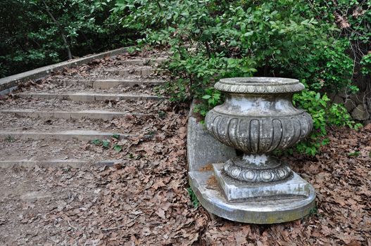 Vintage staircase covered with brown leaves in Tatoi estate summer residence of former Greek royal family now public park.