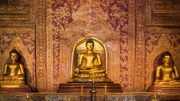 "Phra Sihing Buddha" Thai gold statues at Phra Singh Temple, Chiang Mai, Northern Thailand