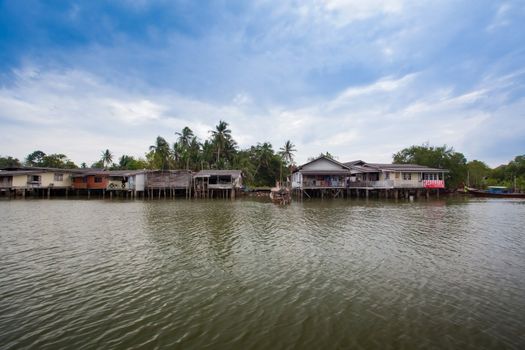 scene of fishing boats at a port in Thailand