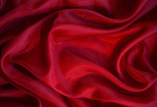 Smooth elegant red silk can use as background 