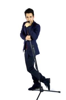 wide shot of singer with microphone white background