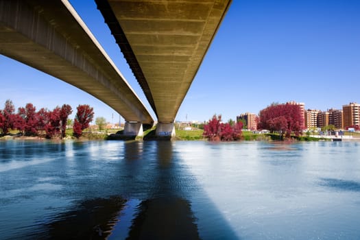 Architectural image of concrete bridge and river