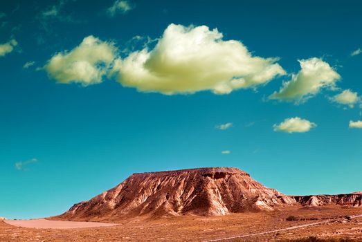 Desert landscape with sand mountain and cloud