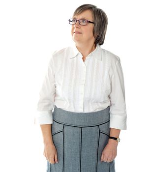 Portrait of an attractive aged businesswoman isolated over white