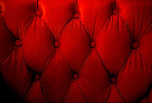 Red retro sofa texture with buttons