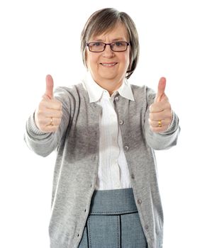 Expressive senior woman isolated on white thumbs-up concept