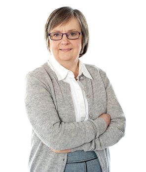 Elderly corporate woman posing in style isolated over white