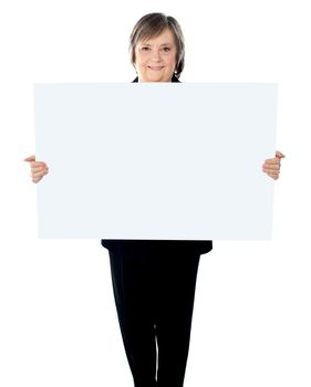 Business executive showing an empty billboard isolated over white