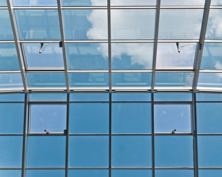 Photo of business center glass ceiling with window motors