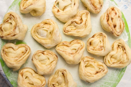 Half-finished product of a roll with cinnamon