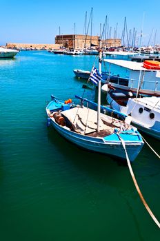 Boat on old fortress background Crete Greece