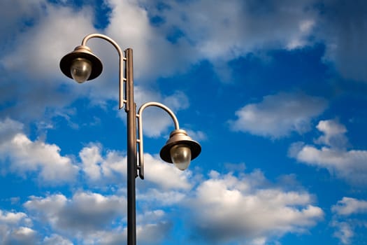 Urban landscape with lamppost and dramatize sky