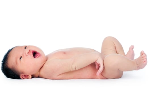 Portrait of a cute newborn infant baby lying down over white background.