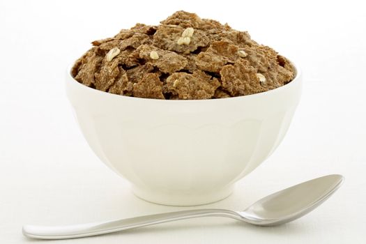 Delicious and nutritious bran flakes cereal, high in bran, high in fiber, served in a beautiful  French Cafe au Lait Bowl with wide rims.  This healthy bran cereal will be an aid to digestive health.