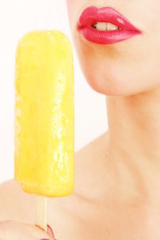 woman licking popsicle