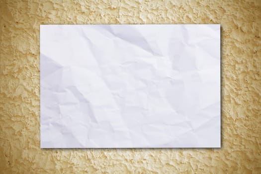 old white paper on rough wall background