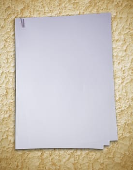 old white paper on rough wall background