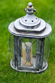 beautifully decorated lantern with a bright candle inside