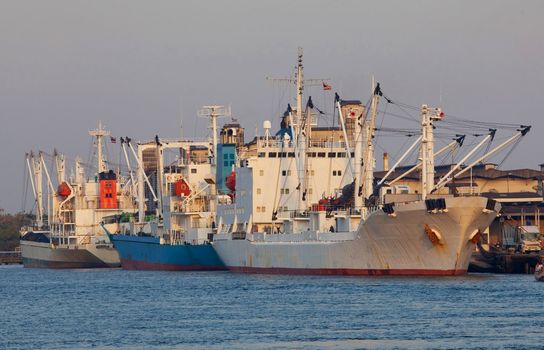 Cargo ship under loading in port