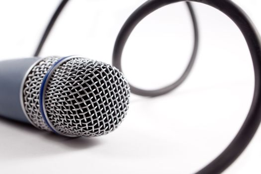 Close up image of isolated microphone and cable