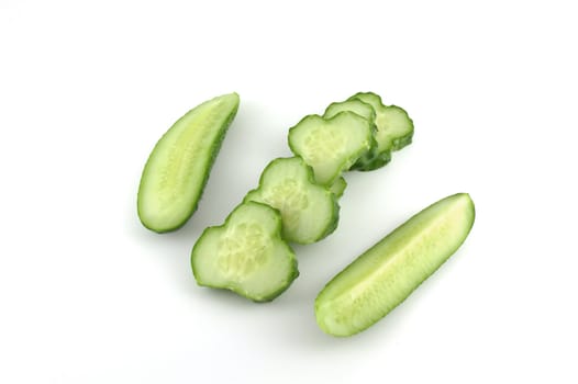 Cutted cucumber over white