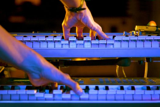 Close up image of musician and piano in concert