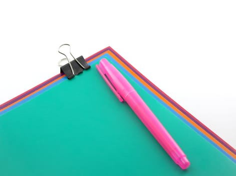 Color papers, black clip and pink marker