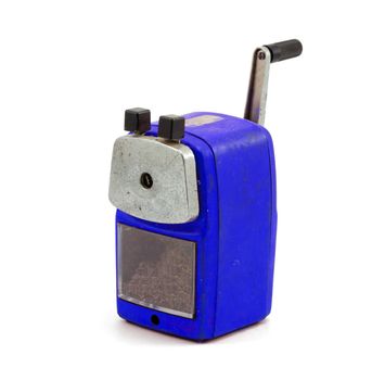 Mechanical sharpener of pencil on the white background