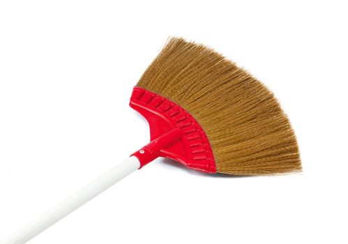 Red broom isolated on white