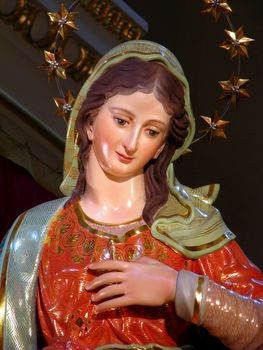 A detail of the statue of The Annunciation of Our Lord Jesus to The Blessed Virgin Mary by the Angel Gabriel displayed in Tarxien, Malta.