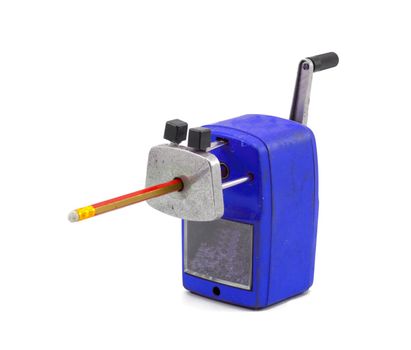 Mechanical sharpener of pencil on the white background