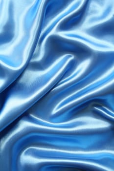 Smooth elegant dark blue silk can use as background 