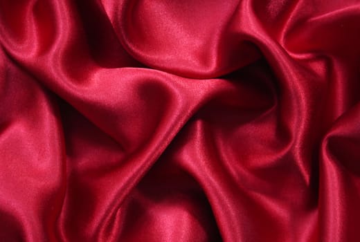 Smooth elegant red silk can use as background 