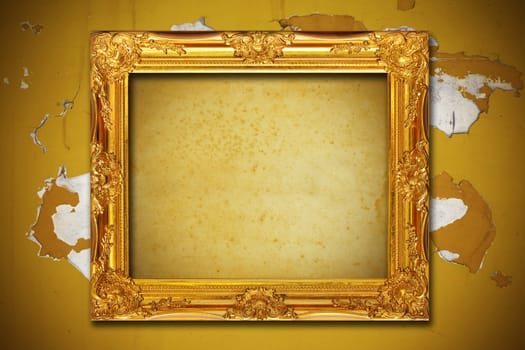 Photo frame on aged brown wall background