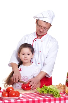 Father and daughter cooking a meal together