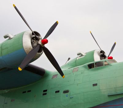 Old plane propeller engine  against   sky background