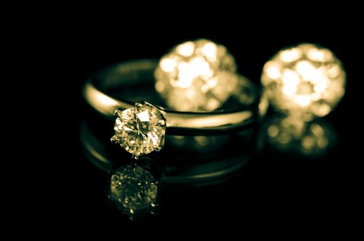 wedding diamond ring on black background