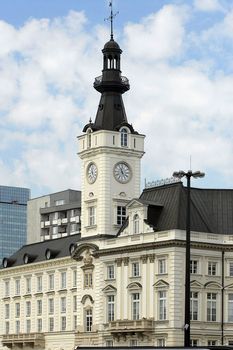 Old ancient tower with clock in Warsaw, Poland