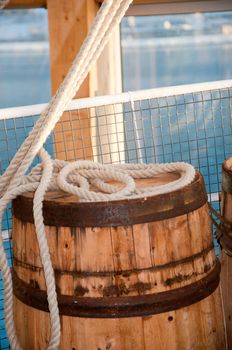 Barrel and rope on sea background. Photo was taken in Tromso, Norwey.
