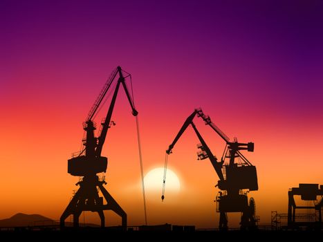 Two cranes sit dramatically against a colorful sunset in a large shipyard