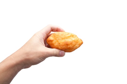 Pie in the hand on a white background