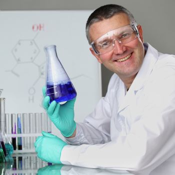Chemistry Scientist conducting experiments in laboratory