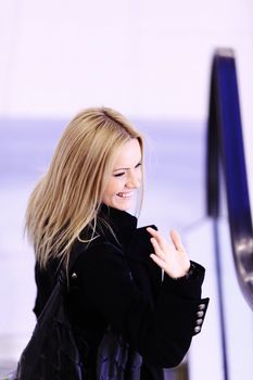 woman in shop center holds the bag in hands