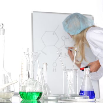 Woman  conducting a chemical experiment