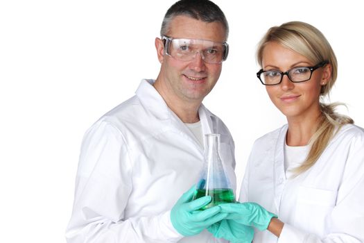  researchers holding a secret green chemical substance