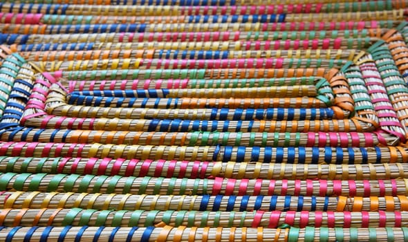 Many color weaved straw basket top in perspective