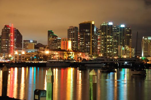 Lights from downtown towers reflect in the calm water of San Diego Bay in Southern California.