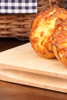fresh and delicious cheese bread on rustic wicker  basket