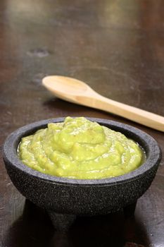 perfectly made mexican guacamole,prepared with fresh avocados lemo juice vinegar and hot and sweet peppers   