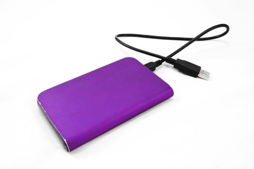 Purple external hard disk on white background